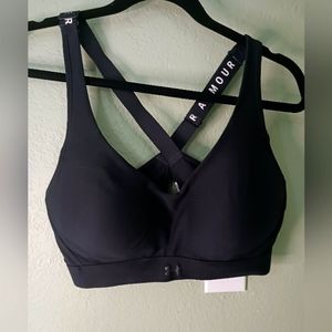 Under armour sports bra with padding. Thick straps and wide banded.